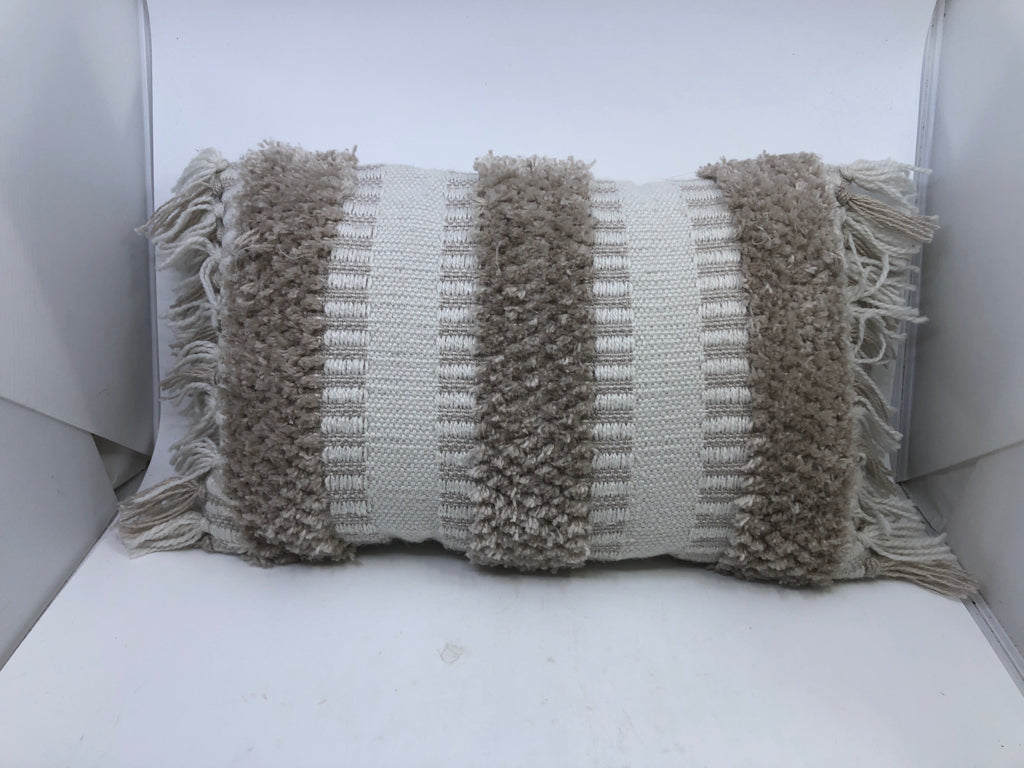 RECTANGLE TAN AND CREAM PILLOW W/FRINGE.