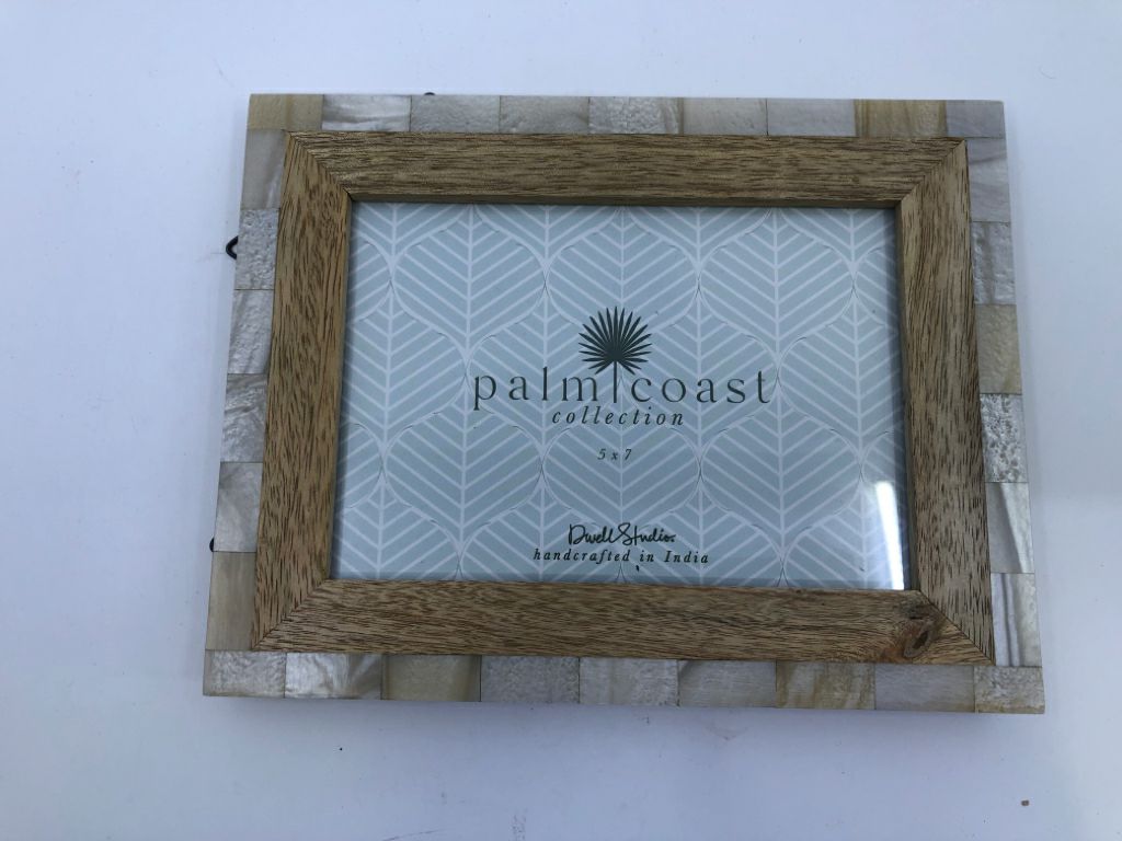 MULTITEXTURED PHOTO FRAME.