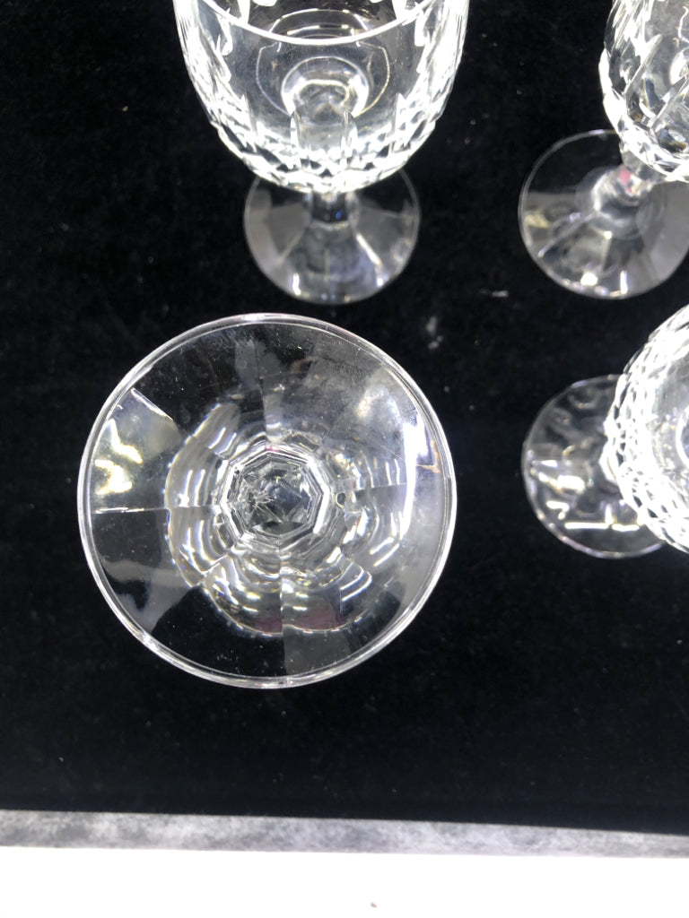 4 CRYSTAL CUT GLASS WINE GLASSES.