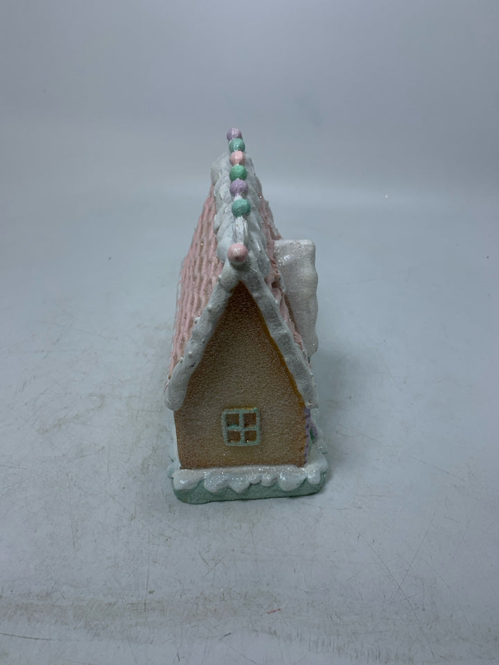 RESIN PASTEL COLORED SPARKLE GINGERBREAD HOUSE.