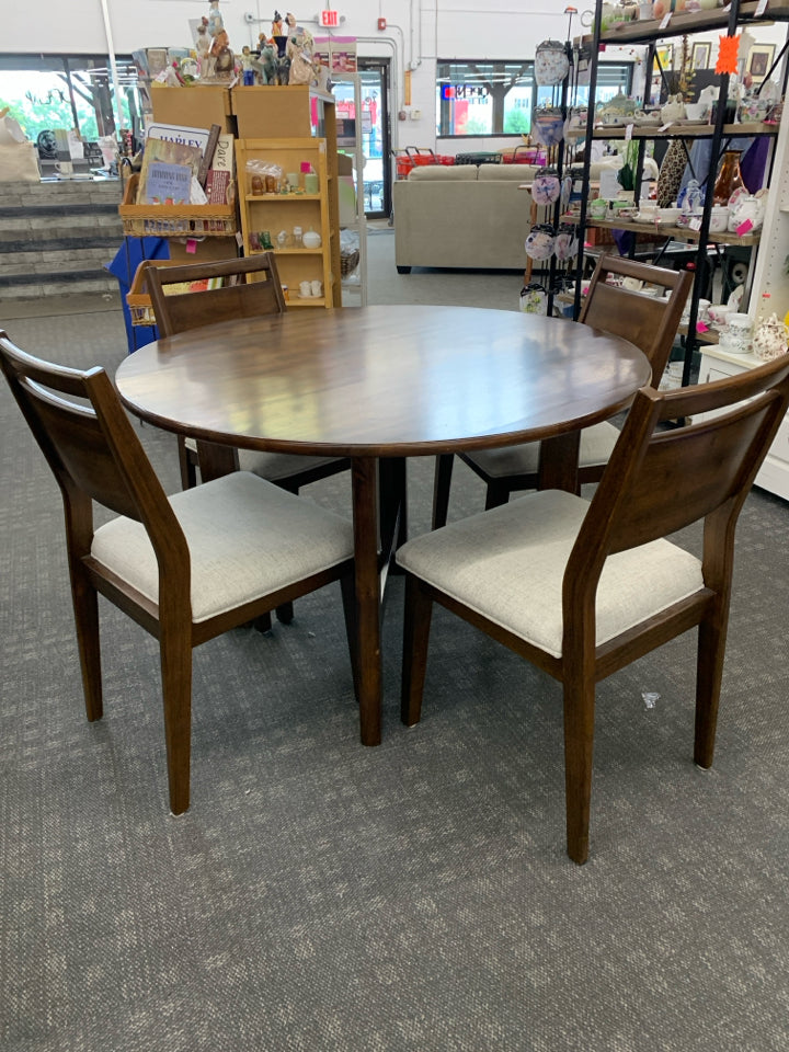 ROUND DK WOOD DINING TABLE W/4 GREY SEAT CHAIRS.