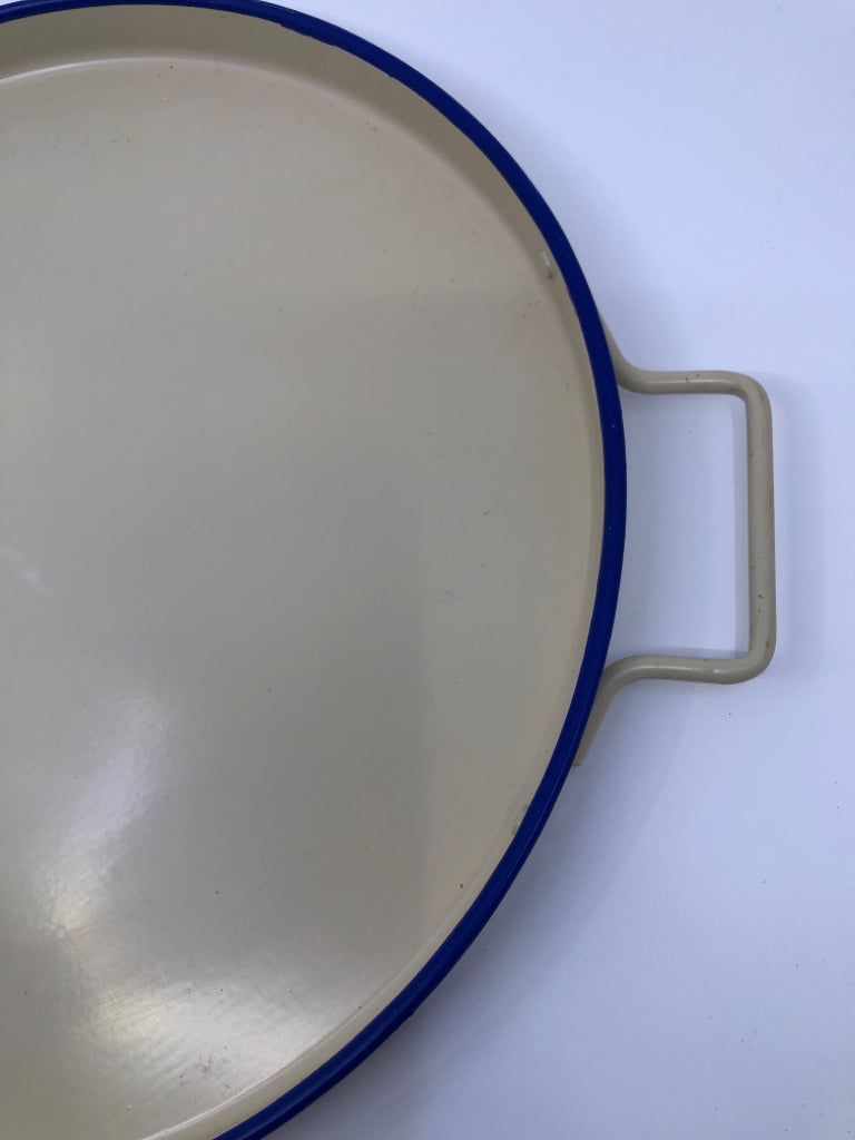 CREAM ROUND METAL TRAY W BLUE RIM.
