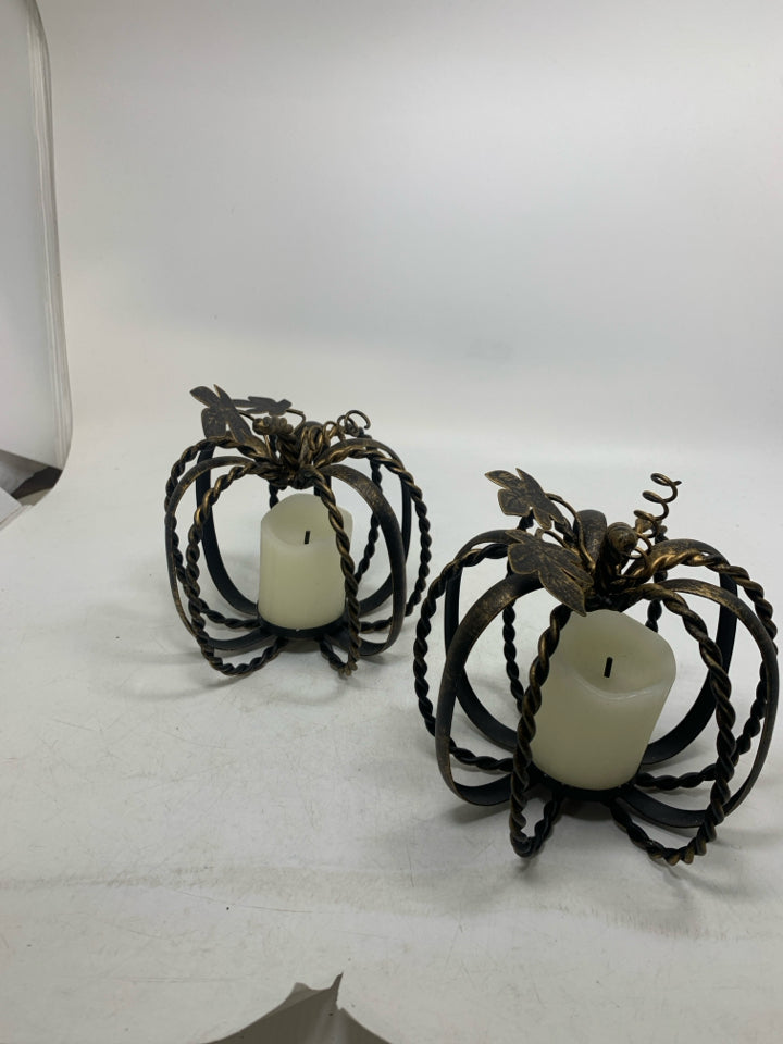 2 METAL PUMPKIN CAGE TEALIGHT HOLDERS BRONZE W/ FAUX CANDLES.
