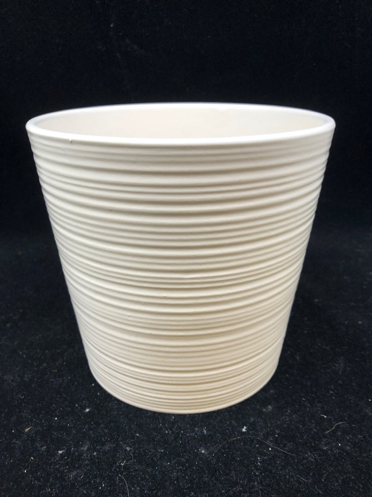 WHITE CERAMIC PLANTER.