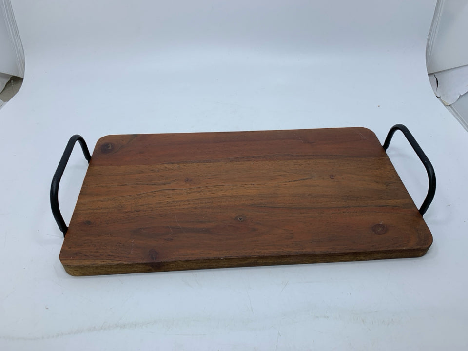 DARK WOOD TRAY W/ BLACK METAL HANDLES.