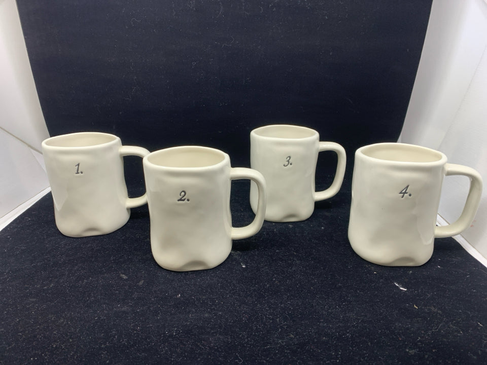 RAE DUNN 1-4 WHITE MUGS.