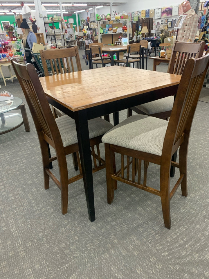 WOOD HIGH TOP TABLE W/ BLACK LEGS 4 UPHOLSTERED.