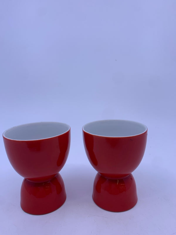 2 RED EGG CUPS.