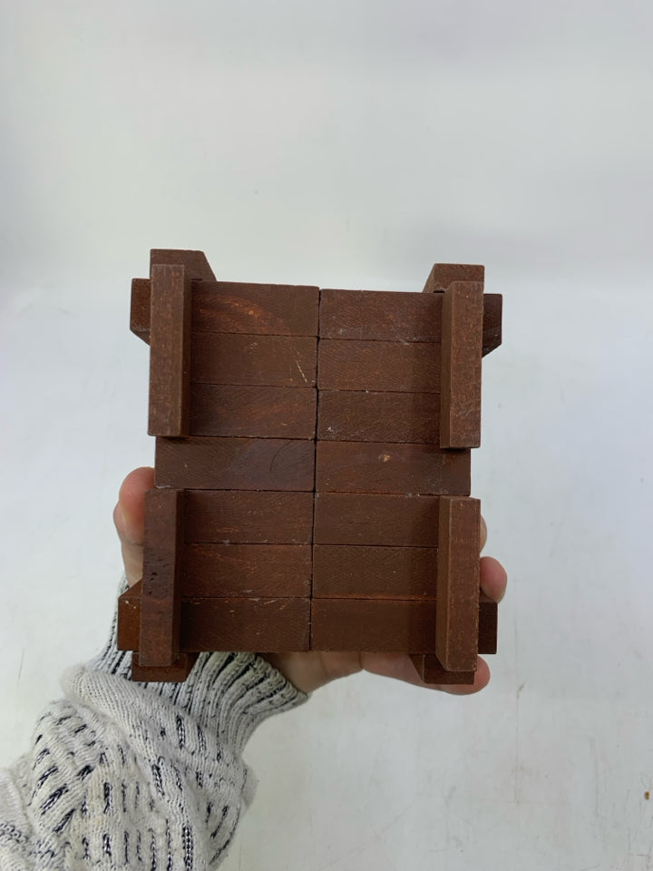 4 2-TONED WOOD COASTERS IN STAND.