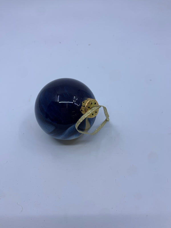 BLUE AND GOLD STRIPED BULB ORNAMENT.