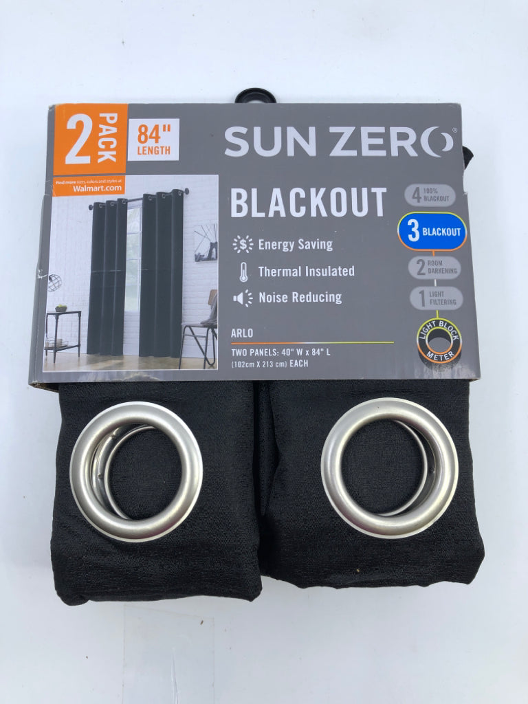 NIP SUN ZERO BLACKOUT CURTAINS.