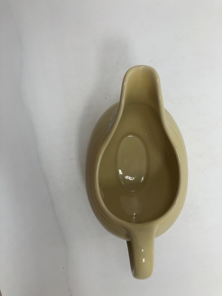 FIESTAWARE CREAM COLORED GRAVY BOAT.