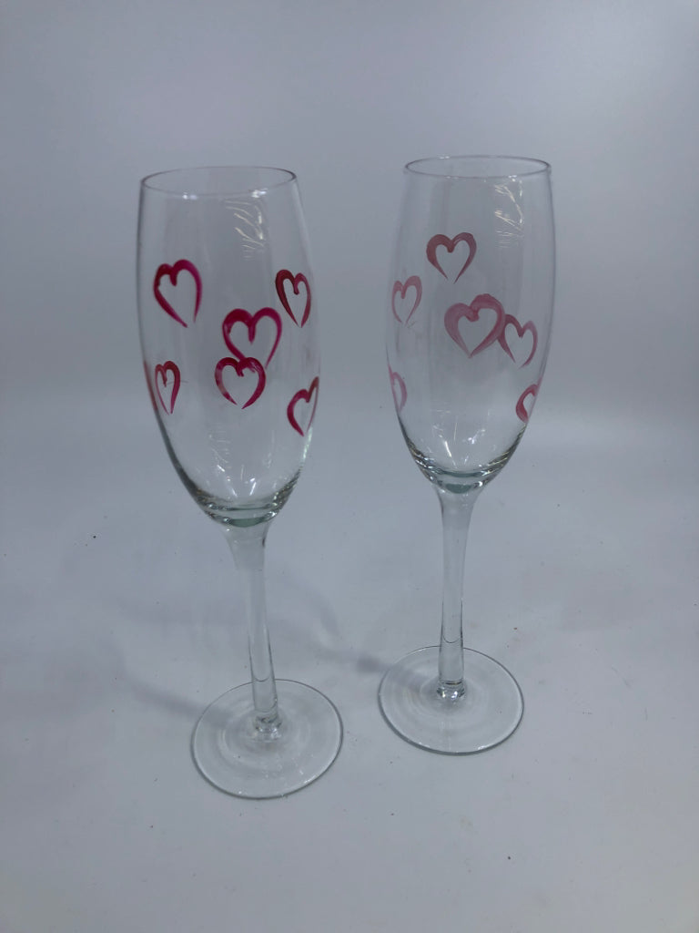 2 PAINTED HEARTS CHAMPAGNE GLASSES.