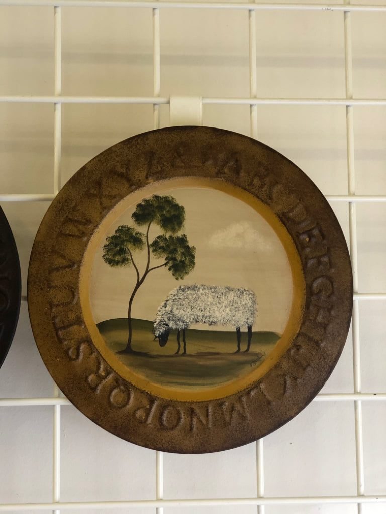 2 CIRCULAR PRIMITIVE SHEEP ALPHABET TIN PLATE WALL HANGING.