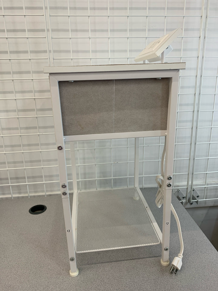WHITE METAL FRAME NIGHTSTAND W/FABRIC DRAWER POWER OUTLET.