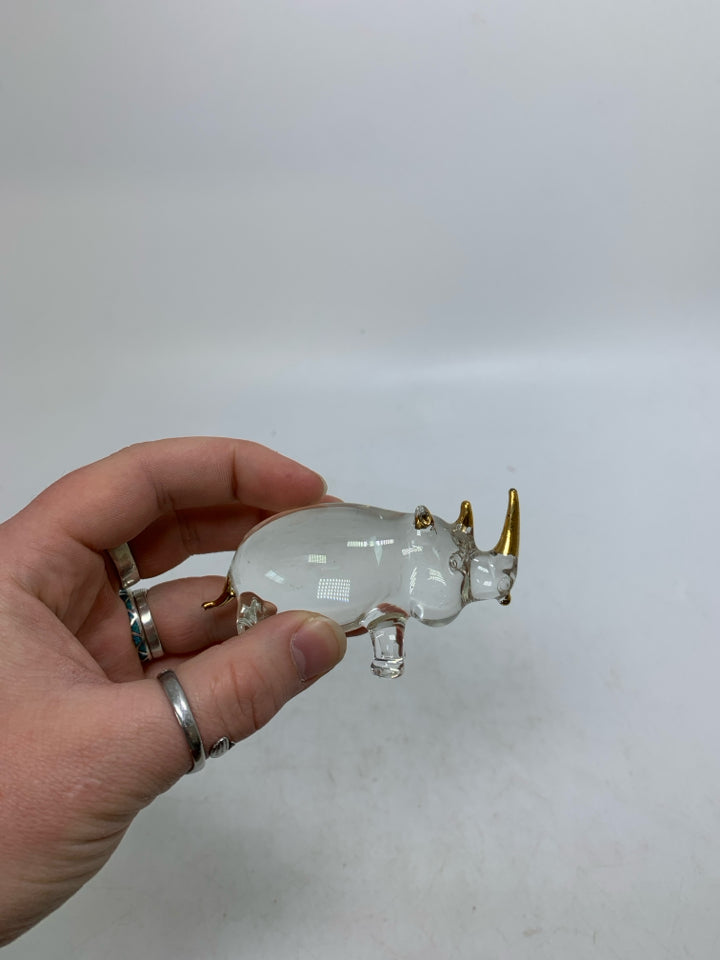 SMALL GLASS RHINO W/ GOLD DETAILS.