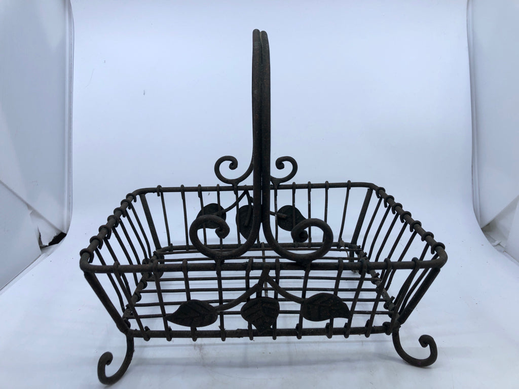 GREEN METAL BASKET.