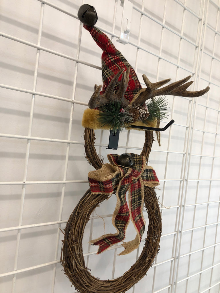 TWIG SNOWMAN W/ANTLERS HANGING.