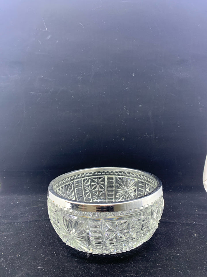 CUT GLASS BOWL W SILVER METAL RIM.