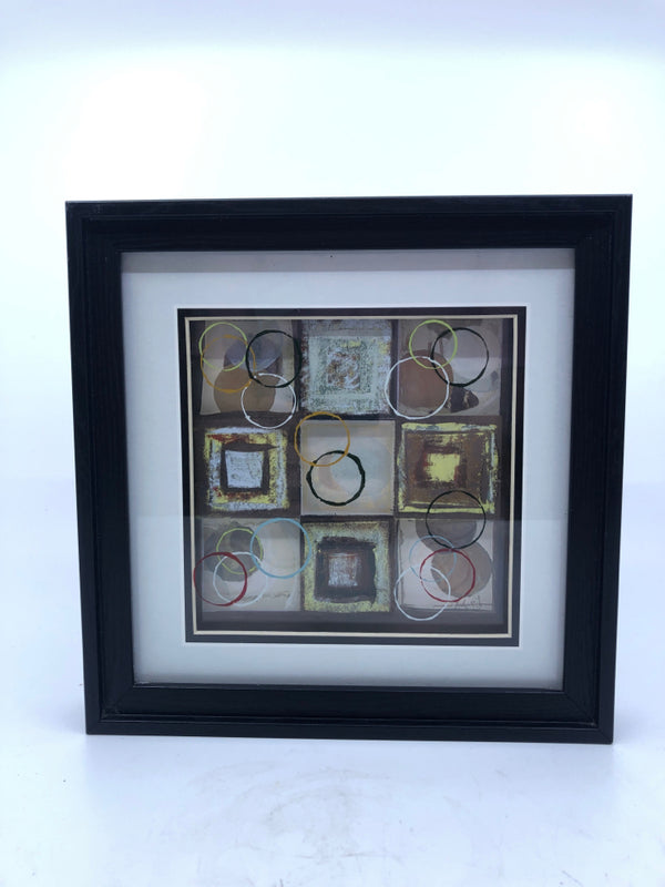 SMALL SHADOW BOX W/ ABSTRACT SQUARES/ CIRCLES ON GLASS WALL ART BLACK FRAME.