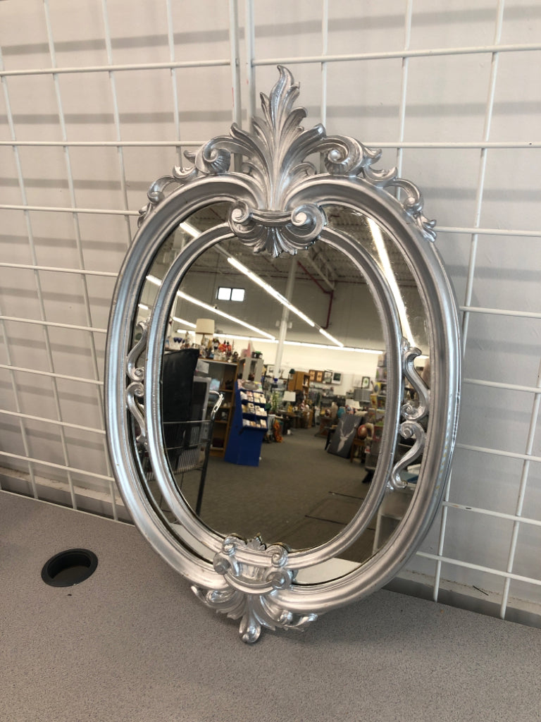 SILVER ORNATE MIRROR.