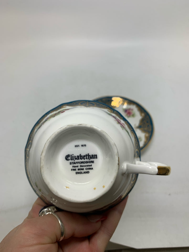 BLUE/GOLD W/ PEACH/BERRIES TEACUP.