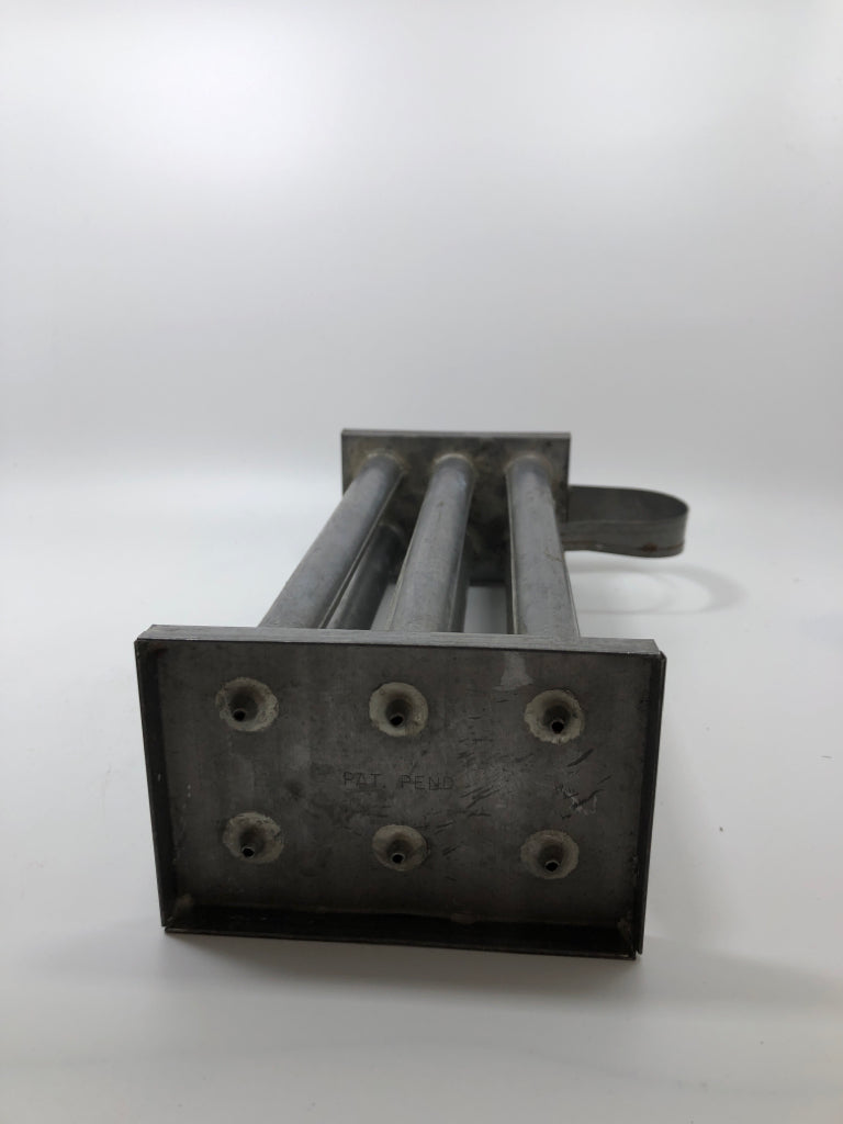 VTG METAL MULTI-TUBE TAPER CANDLE MOLD.