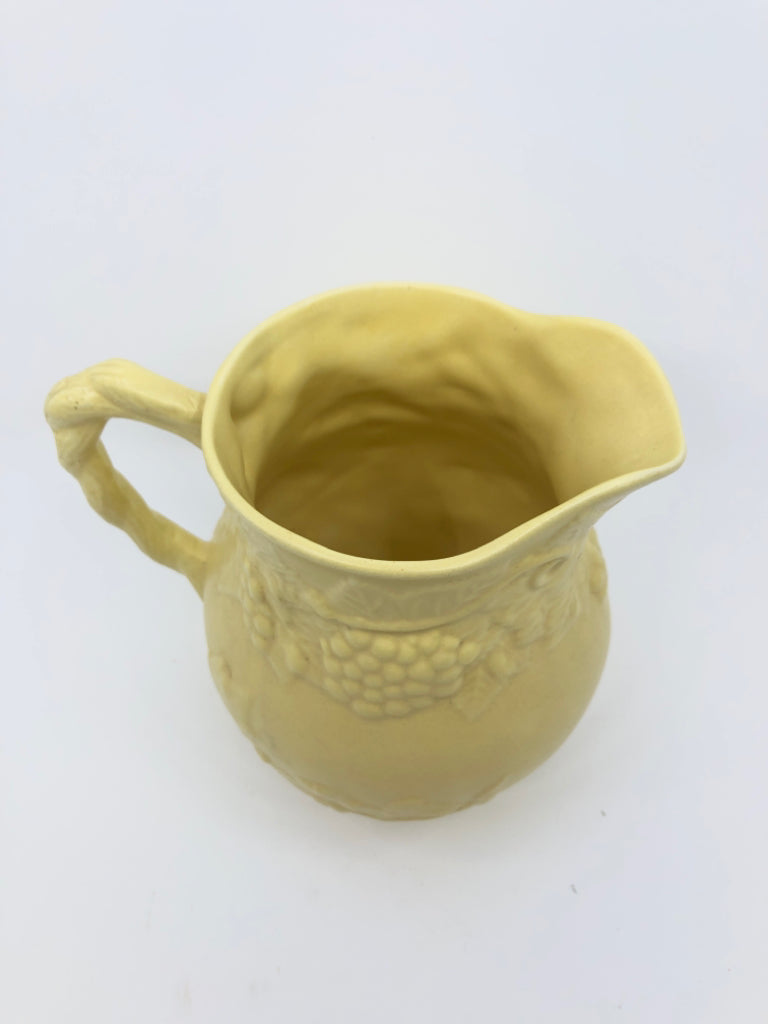 YELLOW EMBOSSED MATTE PITCHER.