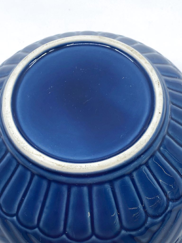 BLUE CERAMIC MIXING BOWL, EMBOSSED LINES DETAIL.