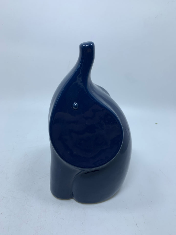 CERAMIC ELEPHANT W/ TRUNK UP.