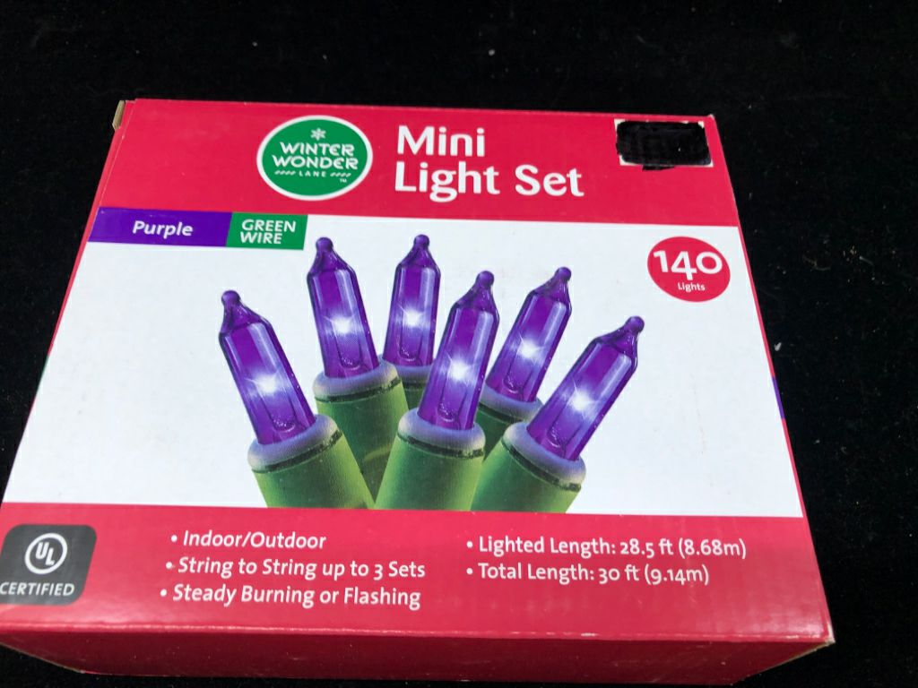 NIB PURPLE MINI LIGHT SET.