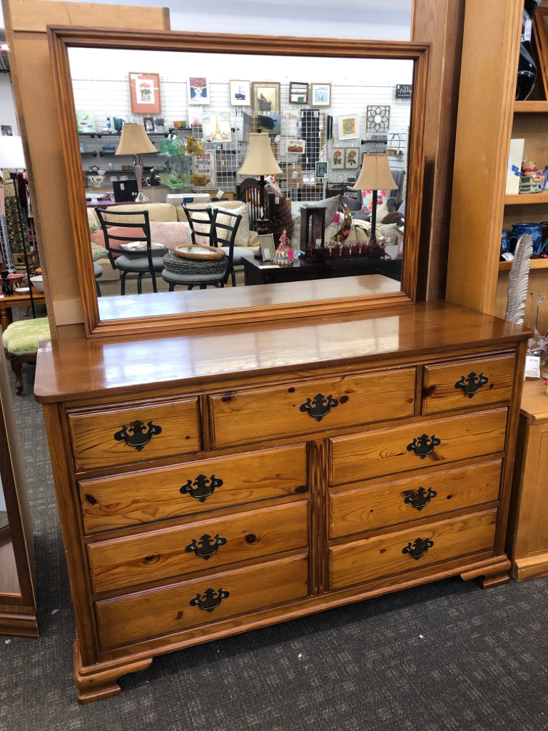WOOD DRESSER W 9 DRAWERS AND MIRROR.