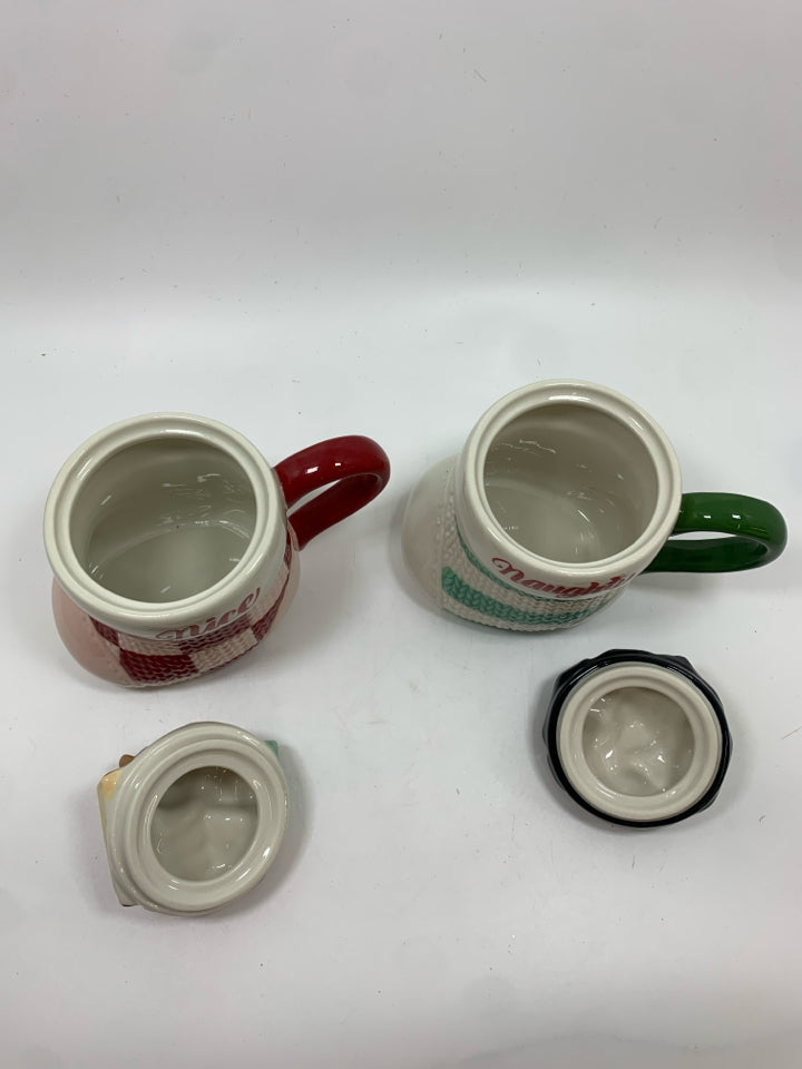 2 NICE/NAUGHTY MUGS W/LIDS.