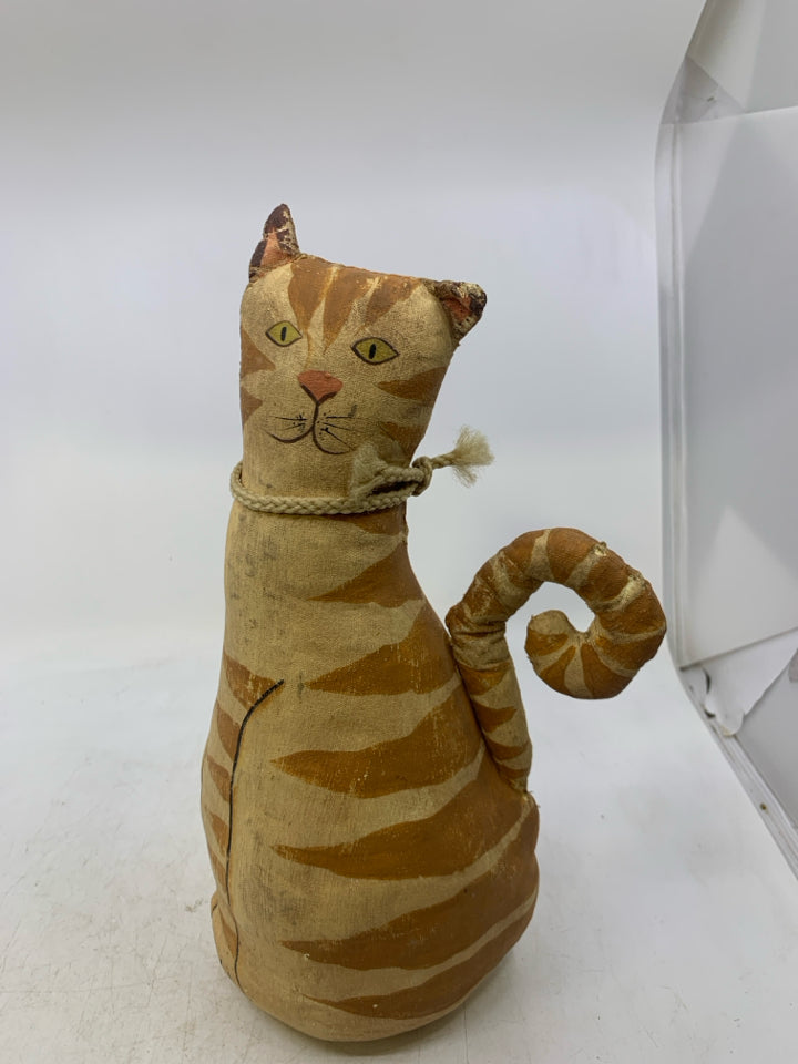 PRIMITIVE ORANGE CAT.