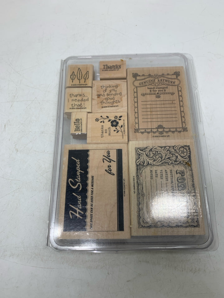 STAMPS IN CASE.