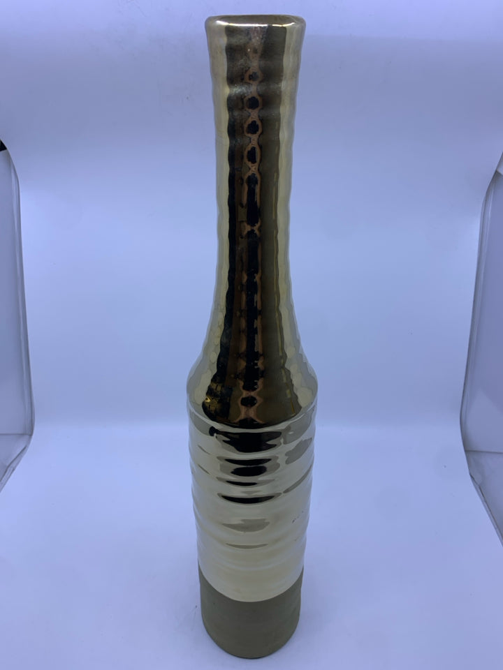 TALL GOLD FLOOR VASE.