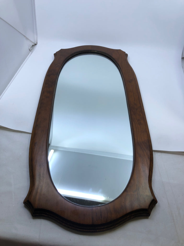 DARK WOOD OVAL MIRROR.