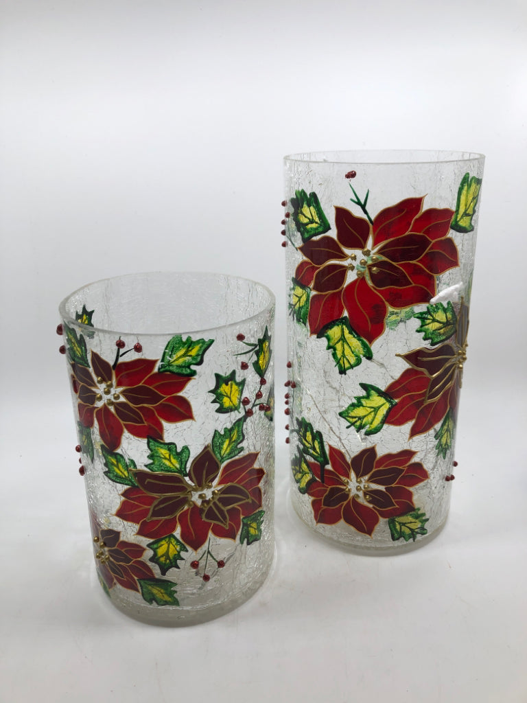 2 LED POINSETTIA HURRICANE LIGHTS IN BOX.
