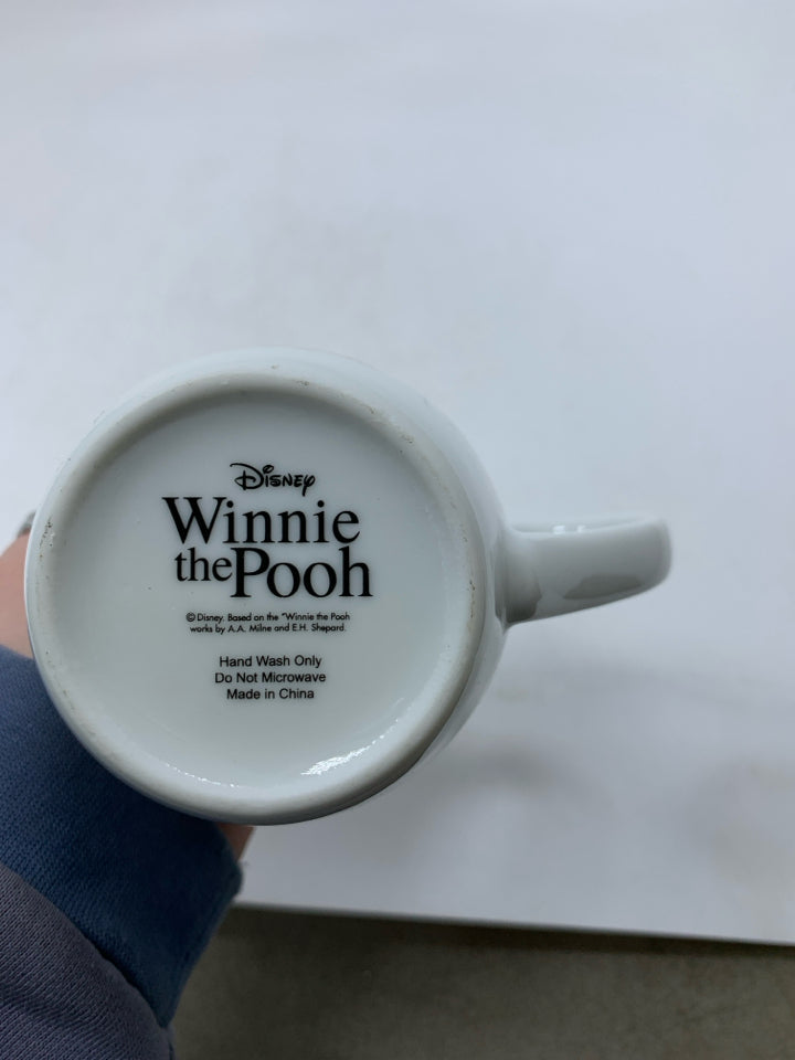 WINNIE THE POOH HUGGING PIGLET FLORAL MUG.