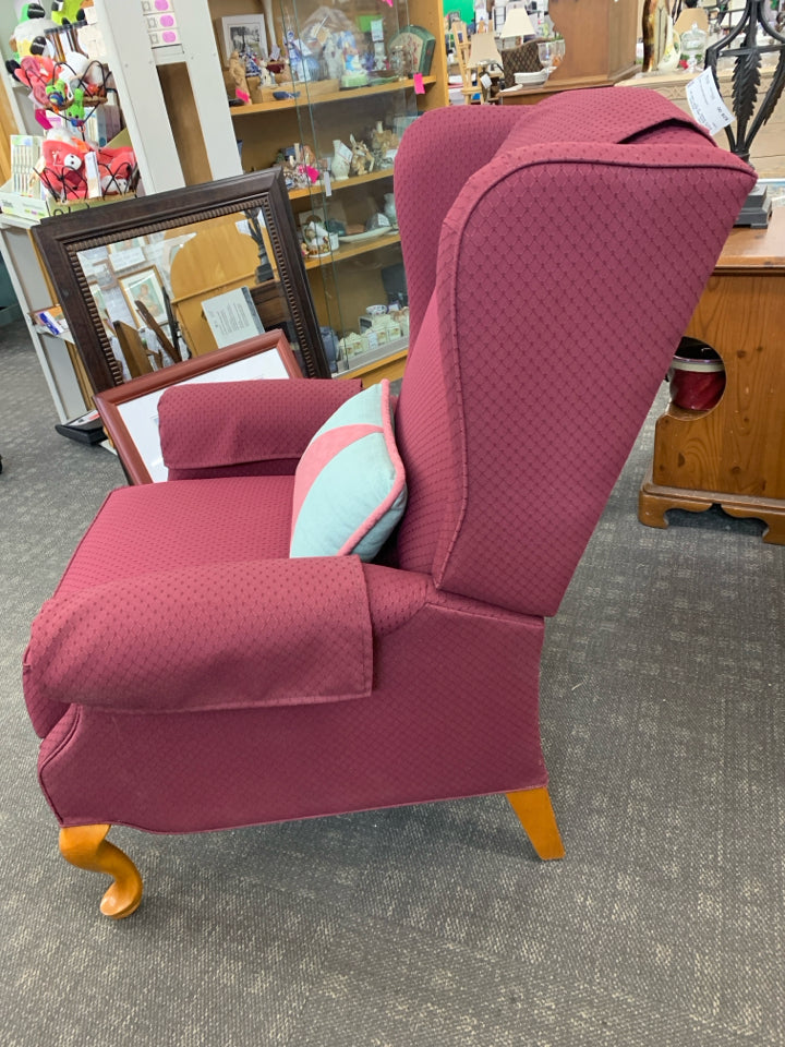 RED FABRIC ACCENT WING CHAIR, WOOD LEGS, THROW PILLOW.