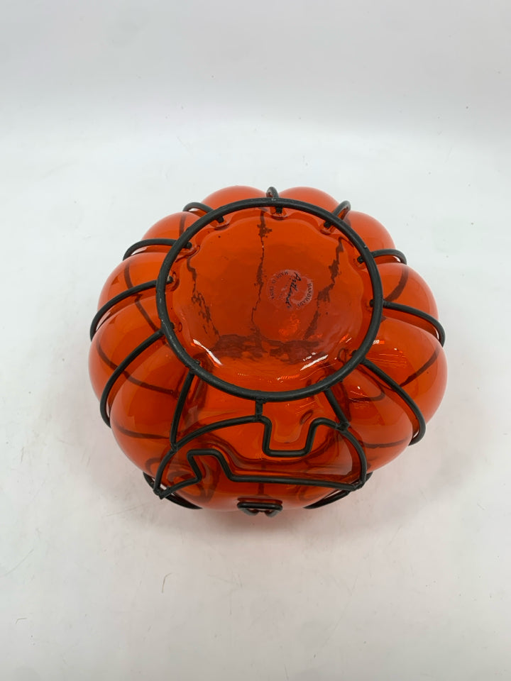 ORANGE GLASS IN BLACK PUMPKIN FACE CANDLE HOLDER.