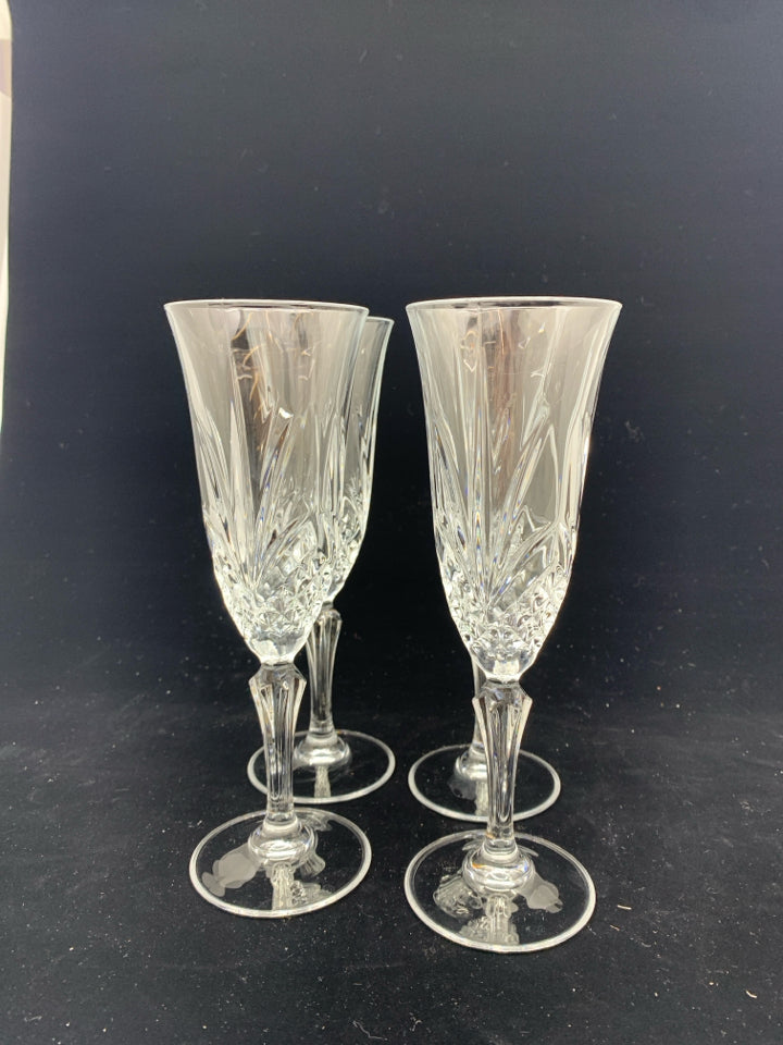 4 CUT GLASS CHAMPAGNE FLUTES.