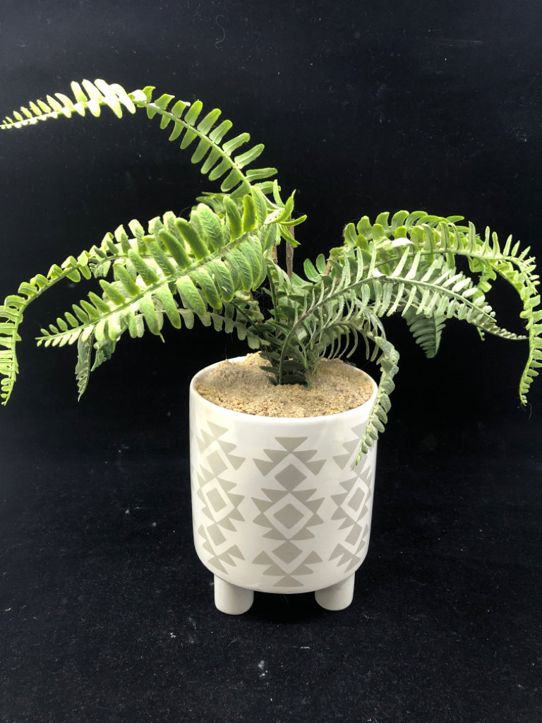 FAUX FERN IN WHITE PLANTER.