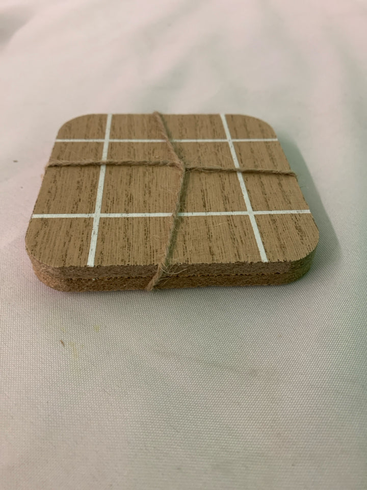NIP 4 WOOD COASTERS.