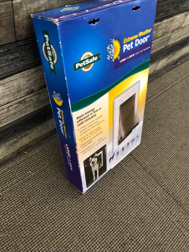 NIB LARGE PET DOOR.