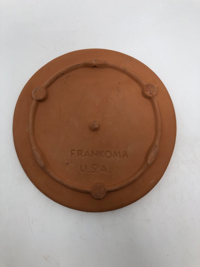 A MOTHER LOVE TERRA COTTA TRIVET.