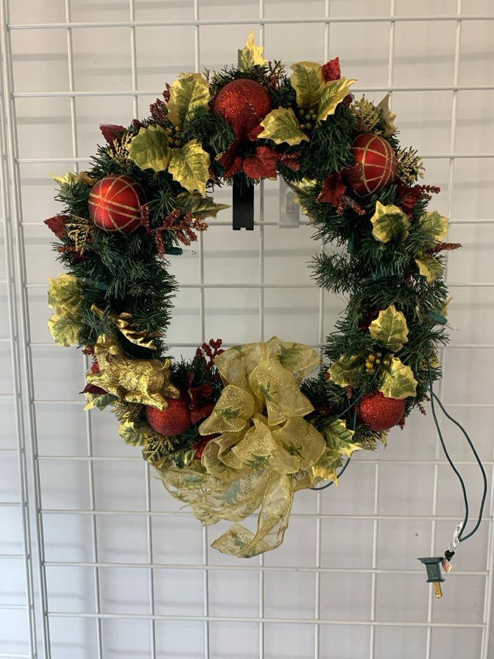 LIGHTED GOLD AND RED WREATH.