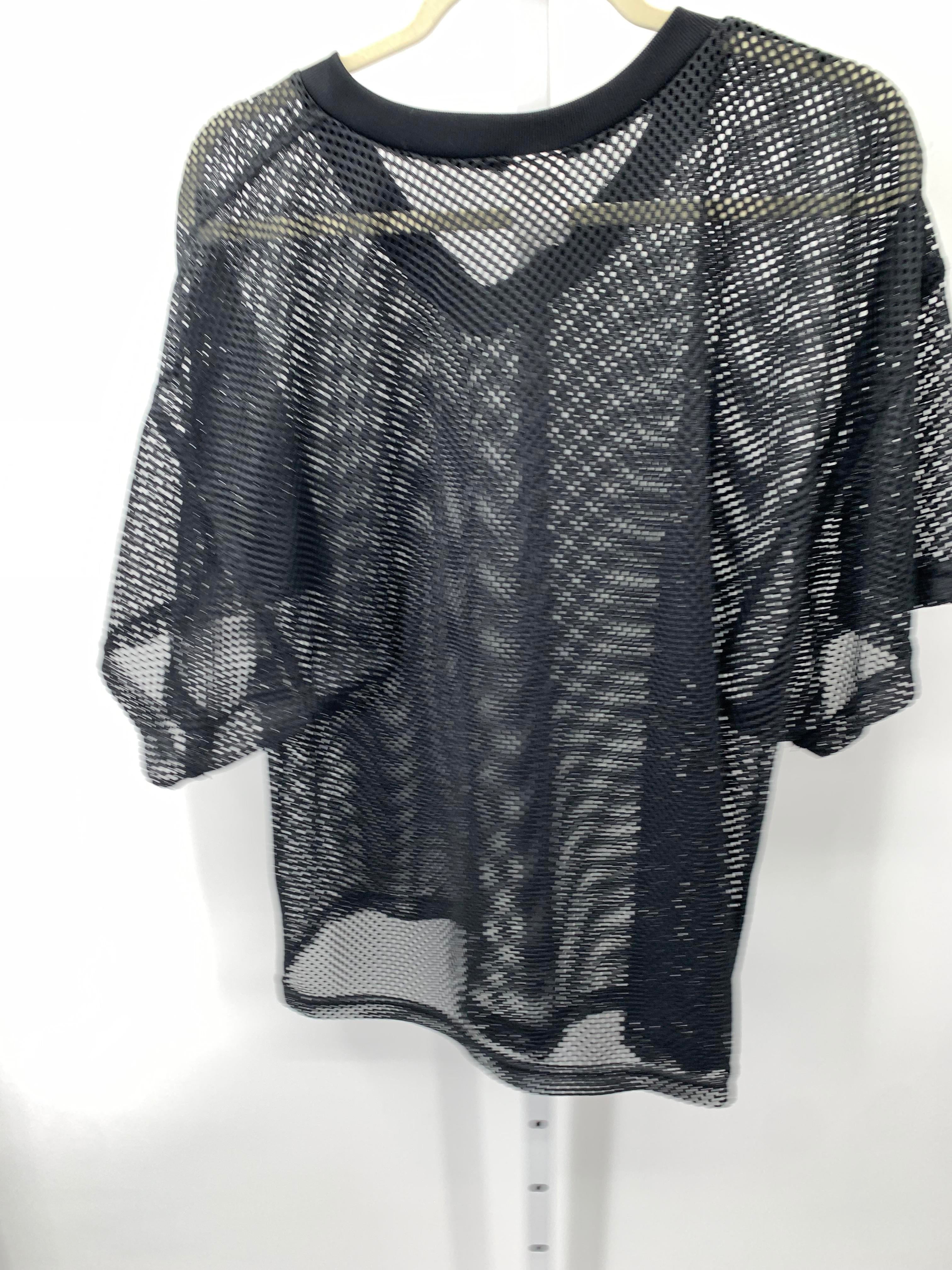 MESH VNECK SHIRT.