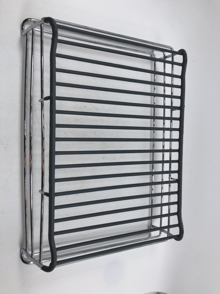 METAL IN THE SINK DRYING RACK.
