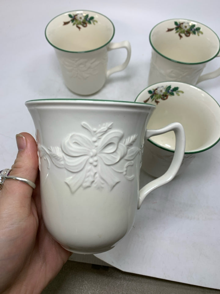 4 MIKASA HOLIDAY SEASON MUGS.
